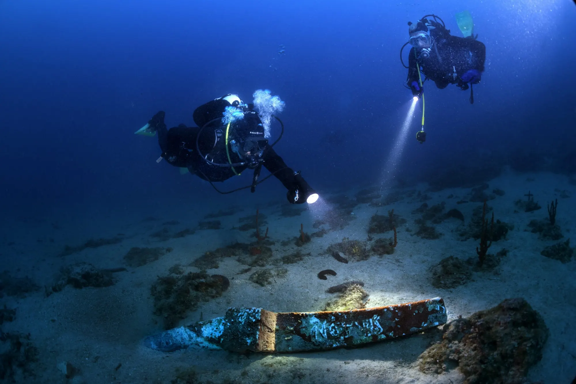 Diver above an amphora field on Pag